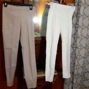 2 pair of H&M Slacks. One pair white the other tan